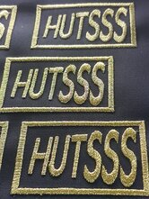 Hutsss-embleem-goud
